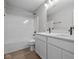 Bathroom featuring a double sink vanity, shower-tub combination, and white cabinets at 4152 Dutton Dr, Bargersville, IN 46106