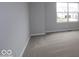 Bedroom with a large window, carpet, and neutral paint at 4152 Dutton Dr, Bargersville, IN 46106