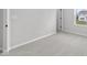 Neutral bedroom featuring soft carpet, white trim, and plenty of natural light at 4152 Dutton Dr, Bargersville, IN 46106