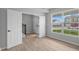 Open bedroom featuring a wood floor, staircase, and large windows with great natural light at 4152 Dutton Dr, Bargersville, IN 46106