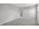 Bedroom featuring neutral walls, plush gray carpet, and a bright interior at 4152 Dutton Dr, Bargersville, IN 46106