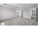 Bedroom featuring a tray ceiling, neutral walls, and plush gray carpet at 4152 Dutton Dr, Bargersville, IN 46106