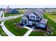 Charming two-story home with manicured lawn, gray roof, and welcoming entrance at 4152 Dutton Dr, Bargersville, IN 46106