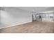 An open living space flows into a kitchen with island and plenty of natural light at 4152 Dutton Dr, Bargersville, IN 46106