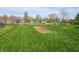 Expansive backyard with well-maintained lawn and space for gardening or recreation at 4631 Belair Cir, Plainfield, IN 46168