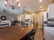 Bright open floor plan with kitchen, dining room, and living room with hardwood floors at 4631 Belair Cir, Plainfield, IN 46168