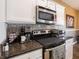 The kitchen counter shows the oven, microwave, coffee maker, and other appliances at 4631 Belair Cir, Plainfield, IN 46168