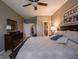 Comfortable main bedroom with large dresser and view into the ensuite bathroom and walk-in closet at 4631 Belair Cir, Plainfield, IN 46168