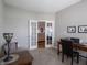 Comfortable office space with neutral walls, French doors, and ample workspace at 4631 Belair Cir, Plainfield, IN 46168