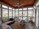 Cozy sunroom filled with natural light and scenic views of the outdoors at 4631 Belair Cir, Plainfield, IN 46168