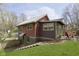 Unique home with beautiful exterior on a lush, landscaped lot at 5110 Riverview Dr, Indianapolis, IN 46208