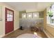 Mudroom with decorative rug, hooks on the wall and storage space at 5110 Riverview Dr, Indianapolis, IN 46208