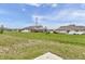 A large, fenced backyard with grass and landscaping at 5218 Triple Crown Way, Indianapolis, IN 46237