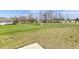 A large, fenced backyard with grass and sparse landscaping at 5218 Triple Crown Way, Indianapolis, IN 46237