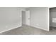 Bedroom featuring a closet and neutral walls and carpet at 5218 Triple Crown Way, Indianapolis, IN 46237
