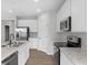 Modern kitchen featuring stainless steel appliances and stylish countertops at 5218 Triple Crown Way, Indianapolis, IN 46237