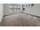 Large bedroom with plush carpet and bright windows at 5267 Chambers Ct, McCordsville, IN 46055