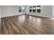 Spacious living area features beautiful floors and large windows with backyard views at 5267 Chambers Ct, McCordsville, IN 46055