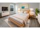 Comfortable main bedroom with a modern decor, large windows and ambient lighting at 5267 Chambers Ct, McCordsville, IN 46055