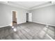 Spacious main bedroom with tray ceiling, plush carpet, and ensuite access at 5267 Chambers Ct, McCordsville, IN 46055
