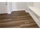Mud room with hardwood floors, bench and built-in shelving at 5267 Chambers Ct, McCordsville, IN 46055