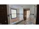 Primary bathroom with large tub, and double sinks at 543 Schooley Dr, Greenwood, IN 46142