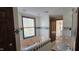 Primary bathroom with large tub, and double sinks at 543 Schooley Dr, Greenwood, IN 46142