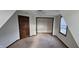 Bedroom with a ceiling fan, large closet, one window, and neutral-colored carpet at 543 Schooley Dr, Greenwood, IN 46142