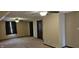 Spacious bonus room with warm neutral walls, carpet flooring, and warm natural light at 543 Schooley Dr, Greenwood, IN 46142