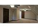Open bonus room featuring neutral walls, carpet flooring, and a warm and inviting space at 543 Schooley Dr, Greenwood, IN 46142