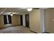 Bonus room with unique architectural ceilings, carpet flooring, and warm natural light at 543 Schooley Dr, Greenwood, IN 46142