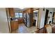 Efficient kitchen featuring granite countertops, stainless steel refrigerator, and tile flooring at 543 Schooley Dr, Greenwood, IN 46142