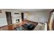 Bright living room featuring hardwood floors, a decorative fireplace, and ample natural light at 543 Schooley Dr, Greenwood, IN 46142