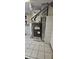 Utility room features tiled floors and a furnace and water heater at 543 Schooley Dr, Greenwood, IN 46142