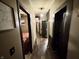 Hallway featuring fresh paint and dark wooden floor at 5845 South St, Stilesville, IN 46180