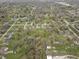 Aerial view showcasing the spacious lots, diverse housing styles, and mature landscaping of this neighborhood at 6107 Rural Dr, Indianapolis, IN 46227