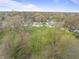 Aerial view of the lush yard and surrounding properties in this quiet neighborhood at 6107 Rural Dr, Indianapolis, IN 46227