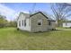 Exterior of home featuring stone facade and white siding at 6107 Rural Dr, Indianapolis, IN 46227
