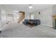 Spacious living room with connecting staircase and open floor plan at 621 Fireside Dr, Greenwood, IN 46143