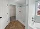 Bathroom with a walk-in shower, vanity, and a glimpse of the closet area for convenient storage at 6234 N Woods Edge Dr, McCordsville, IN 46055