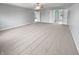 Bright and airy bedroom features neutral walls, plush carpeting, and access to an en-suite bathroom at 6234 N Woods Edge Dr, McCordsville, IN 46055