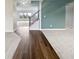Bright foyer featuring hardwood floors and view of living room with lots of natural light at 6234 N Woods Edge Dr, McCordsville, IN 46055