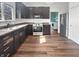 Kitchen features stainless steel appliances, and laminate flooring at 6234 N Woods Edge Dr, McCordsville, IN 46055