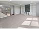 Spacious living room featuring custom built-in shelving at 6234 N Woods Edge Dr, McCordsville, IN 46055