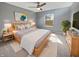 Cozy main bedroom featuring a ceiling fan, a double bed and lots of natural light at 6234 N Woods Edge Dr, McCordsville, IN 46055