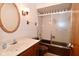 Bathroom featuring a vanity, mirror, and shower with sliding glass doors at 6318 Dahlia Dr, Indianapolis, IN 46217