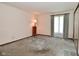 Bedroom featuring a window, carpeted floor, and neutral decor at 6318 Dahlia Dr, Indianapolis, IN 46217