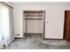 Open closet featuring shelving and a clothing rack at 6318 Dahlia Dr, Indianapolis, IN 46217