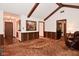 Spacious living room with wood accents, fireplace, and a view into the foyer at 6318 Dahlia Dr, Indianapolis, IN 46217