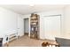 Cozy bedroom with neutral carpet, built-in bookshelf, and a spacious closet at 664 N County Road 800 E, Avon, IN 46123